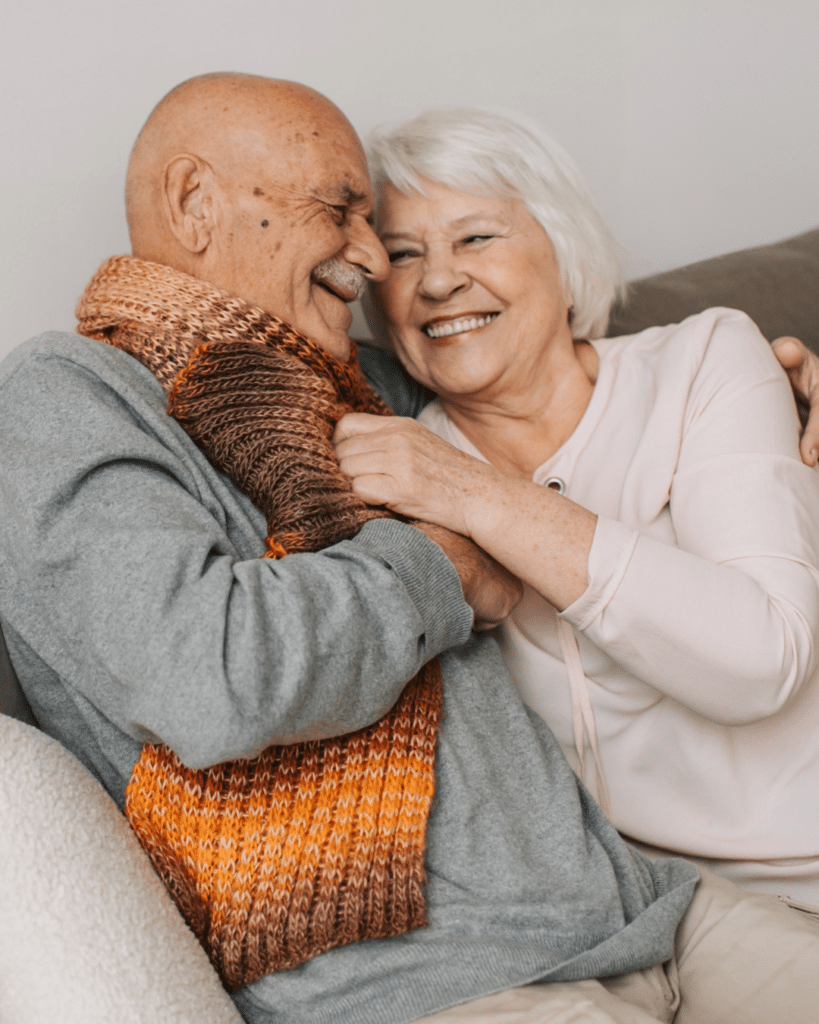 Senior couple enjoying time together in a comfortable downsized home environment